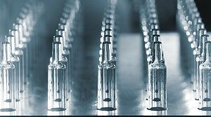 Baked-on siliconization for prefillable glass syringes